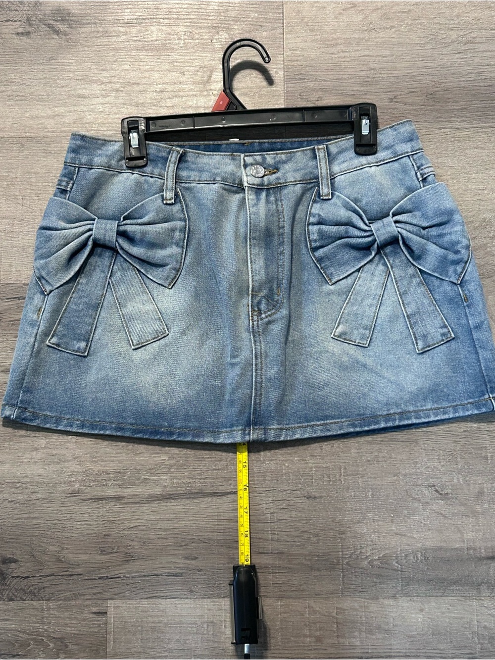 SHEIN Light Blue Denim Mini Skirt with Front Bow Details